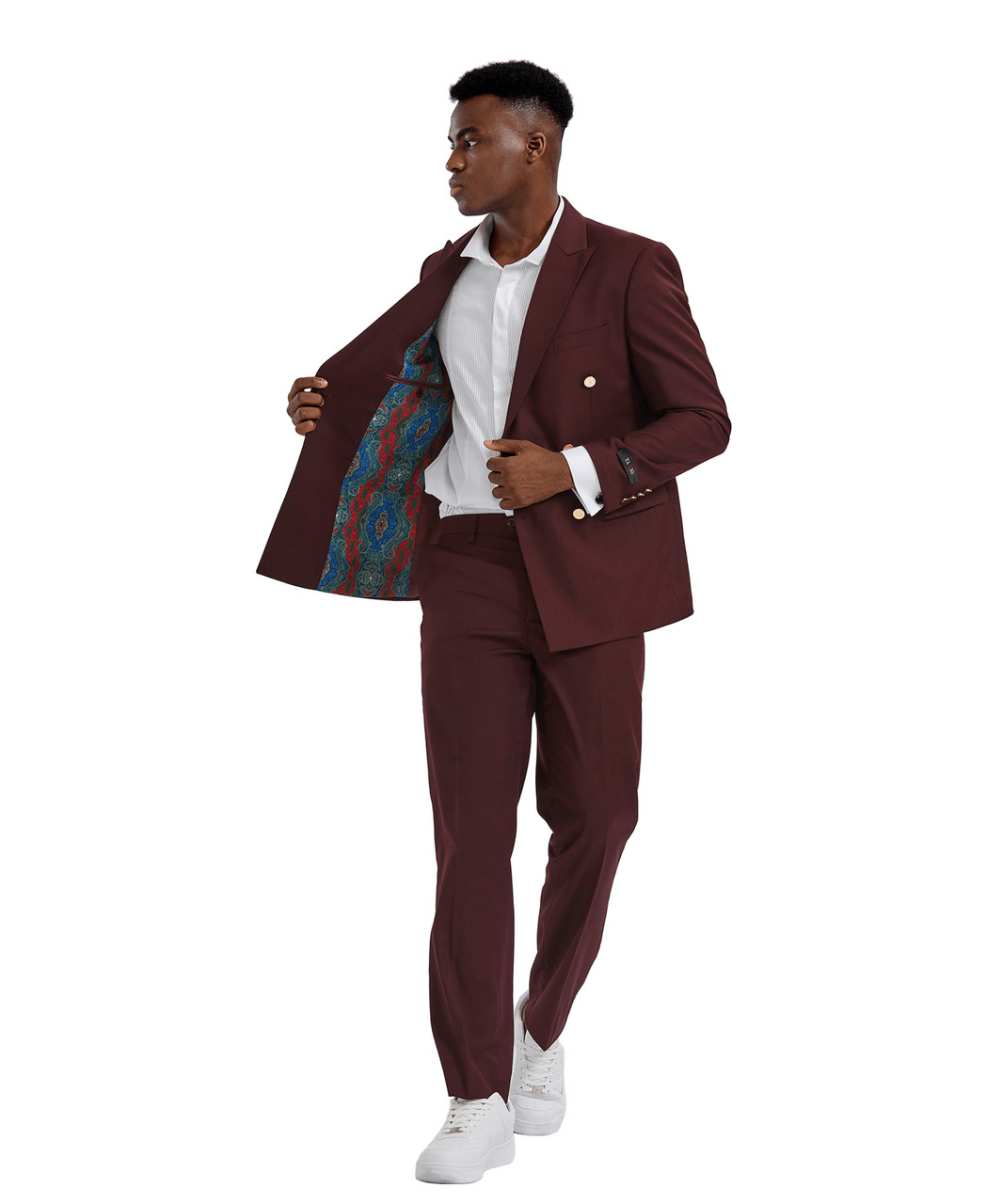 Man wearing a 2-piece solid burgundy suit. A double breasted jacket with solid colored pants.