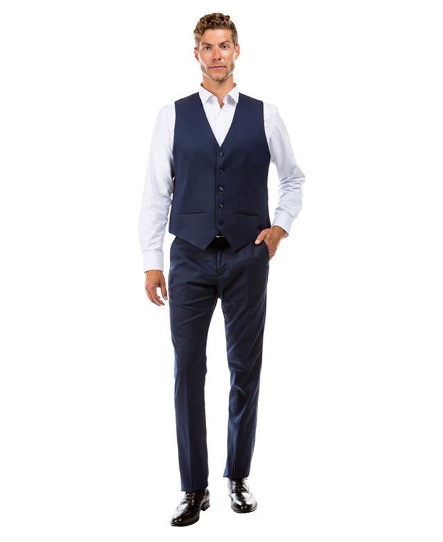 A picture of man wearing a vest and dressing pants colored Deep Ocean Blue from the Suits & Separates Collection By Zegarie (brand).